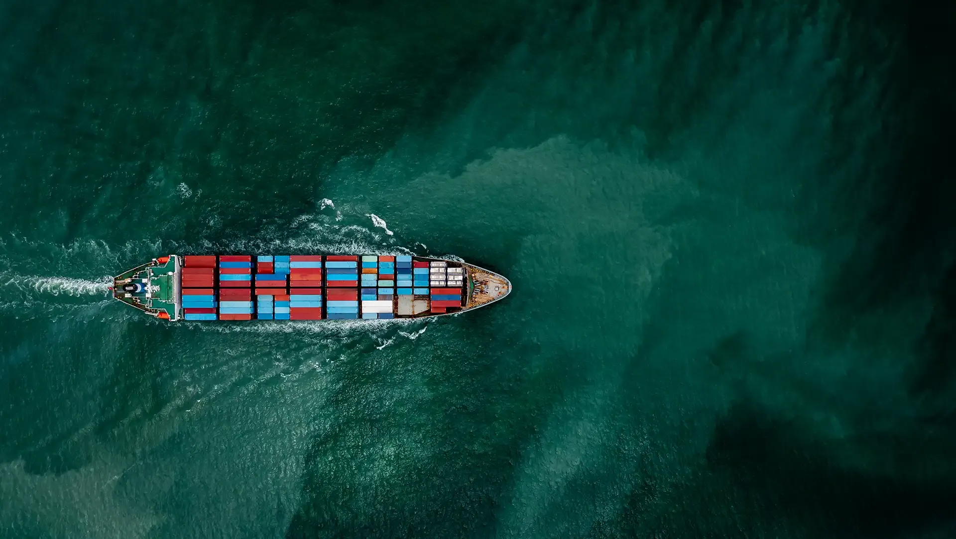 A ship at sea viewed from the air